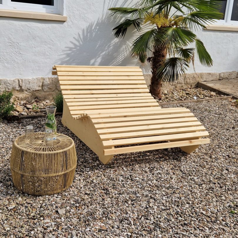 Die ergonomische sonnenliege macht sich perfekt im entspannten außenbereich